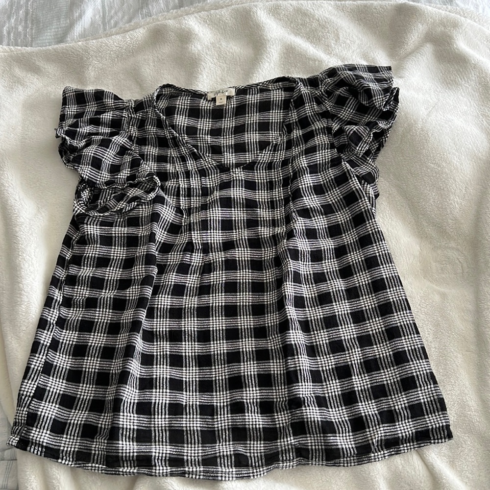 Black and white shirt with petal sleeve.  Perfect summer shirt.  Barely worn.